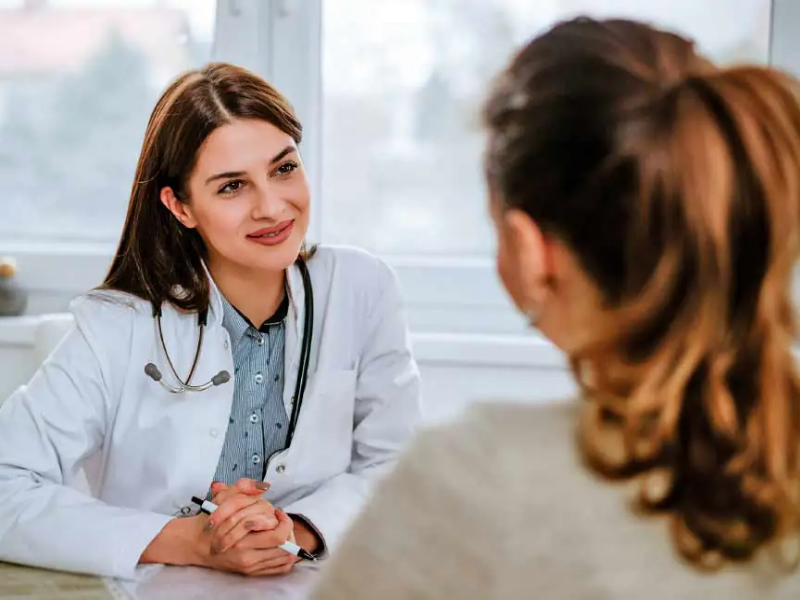 Provider speaking with patient at clinic